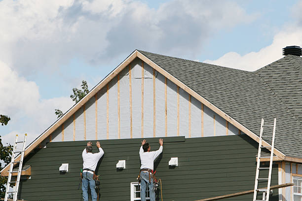 Professional Siding Contractor technician working in Hampton, MN